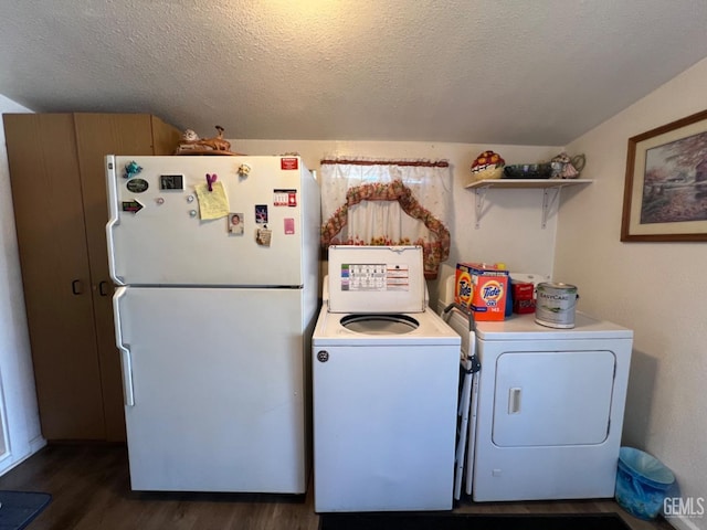 220 Tyler St, Taft, CA 93268 - laundry area with dark wood-type flooring, a textured ceiling, and separate washer and dryer