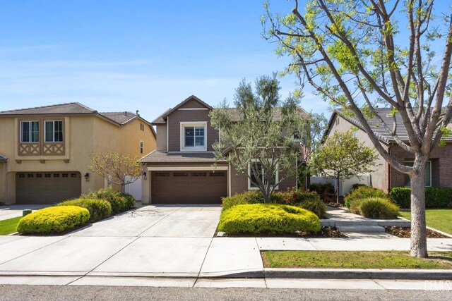 8113 Mcgraw Hill Dr, Bakersfield, CA 93311 - view of front facade with an attached garage, driveway, and stucco siding
