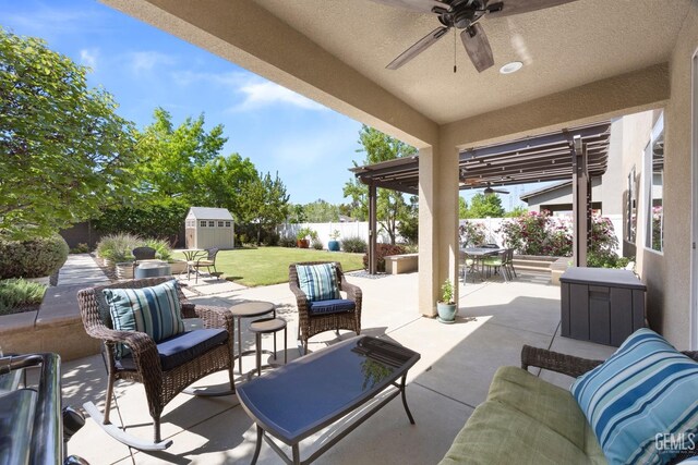 8113 Mcgraw Hill Dr, Bakersfield, CA 93311 - view of patio / terrace with an outbuilding, a ceiling fan, a shed, outdoor dining area, and an outdoor living space