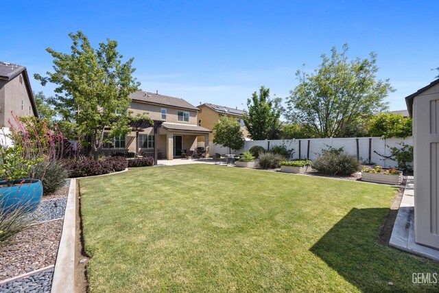 8113 Mcgraw Hill Dr, Bakersfield, CA 93311 - view of yard with a fenced backyard and a patio area