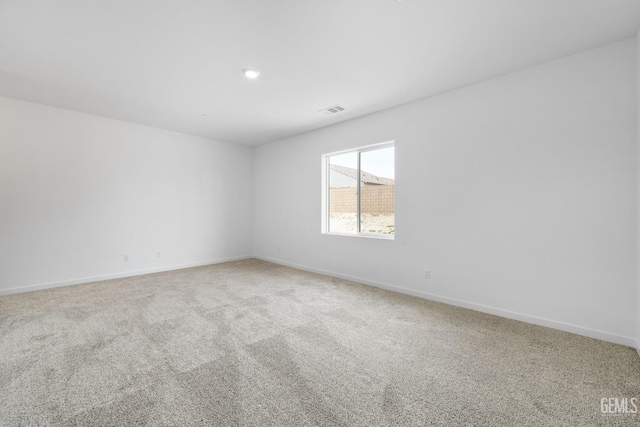 view of carpeted spare room