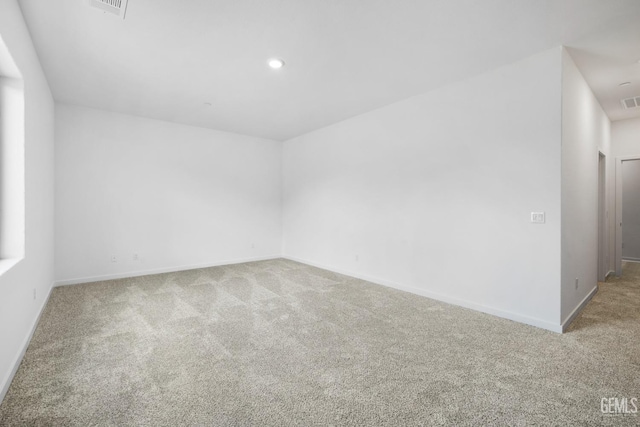 view of carpeted spare room