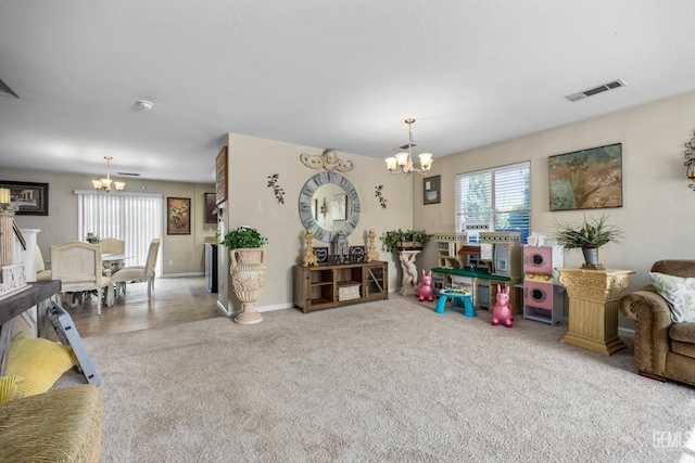 9301 Cobble Mountain Rd, Bakersfield, CA 93313 - living room featuring a chandelier, carpet flooring, and baseboards