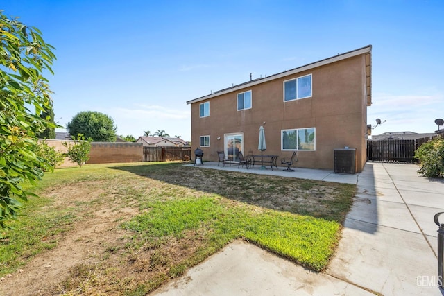9301 Cobble Mountain Rd, Bakersfield, CA 93313 - back of house featuring a patio area and stucco siding