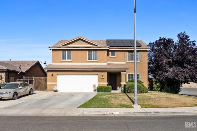 9301 Cobble Mountain Rd, Bakersfield, CA 93313 - view of front facade featuring stucco siding, roof mounted solar panels, a garage, a tiled roof, and concrete driveway