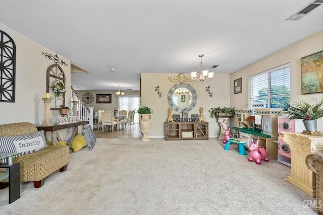 9301 Cobble Mountain Rd, Bakersfield, CA 93313 - carpeted living room with a chandelier, plenty of natural light, stairway, and baseboards