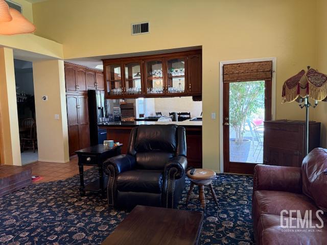 2012 Calle Las Brisas, Bakersfield, CA 93309 - tiled living room featuring a high ceiling