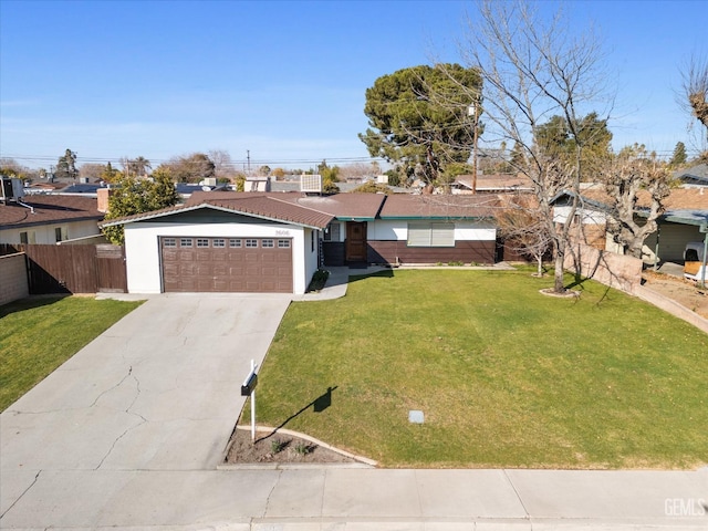 single story home with a garage and a front yard