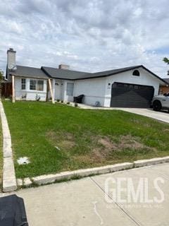 1024 Hazelnut St, Wasco, CA 93280 - ranch-style home with an attached garage, driveway, and a front lawn