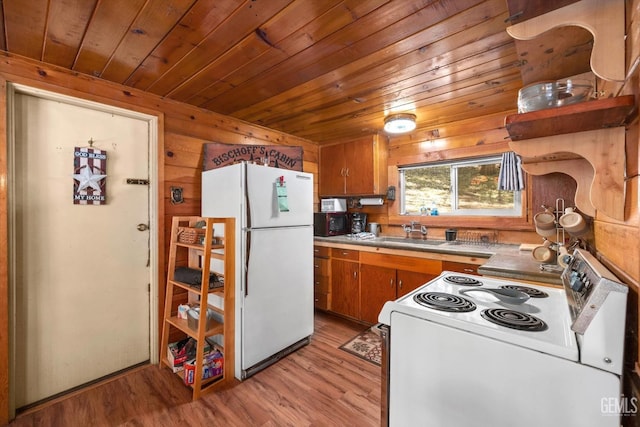 kitchen featuring sink, wood ceiling, white appliances, and light hardwood / wood-style flooring