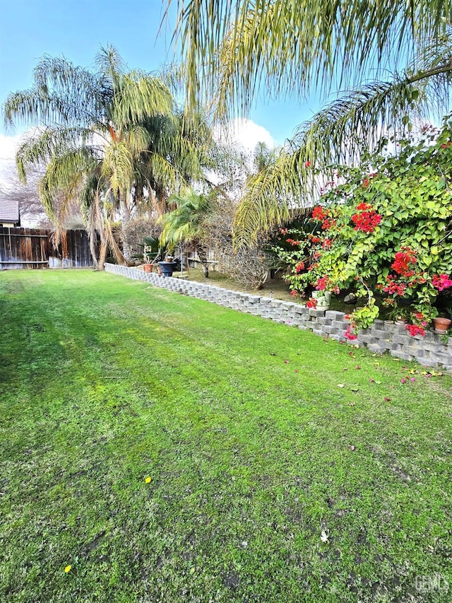 view of yard featuring fence