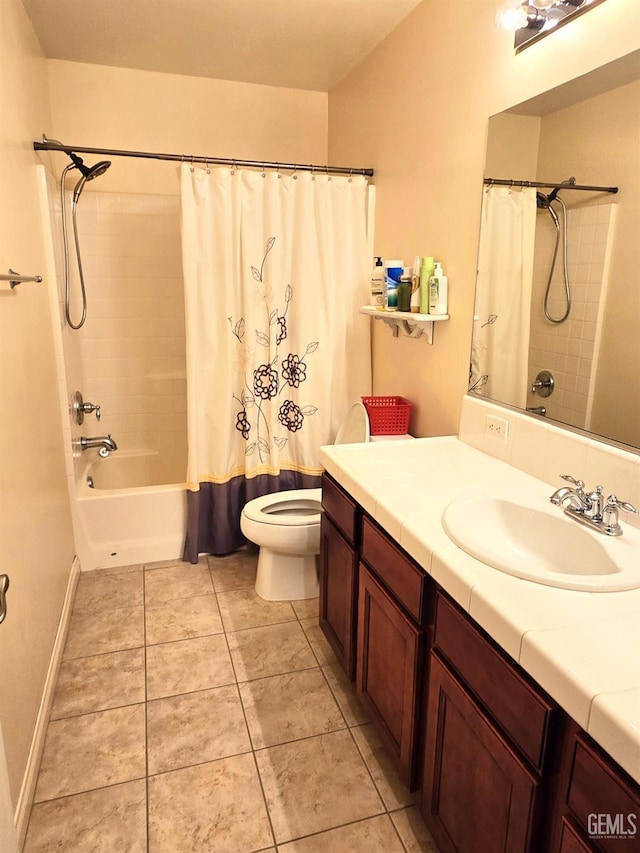 full bathroom featuring tile patterned floors, vanity, toilet, and shower / tub combo with curtain