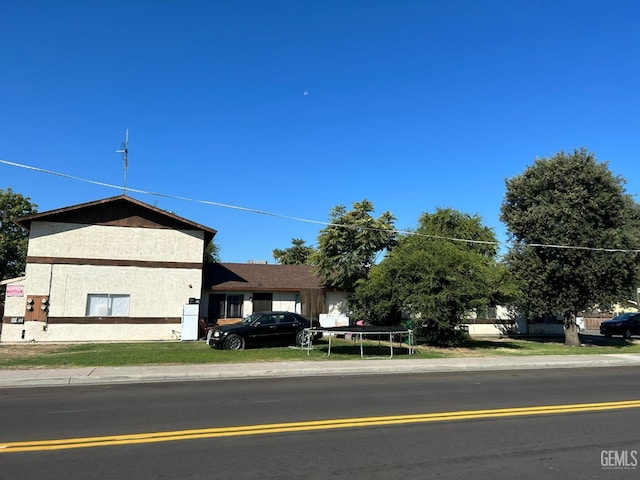 view of front of home featuring stucco siding