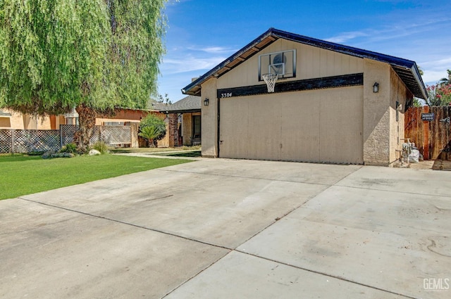 3304 Charlotte St, Bakersfield, CA 93313 - view of front of house featuring driveway and a garage