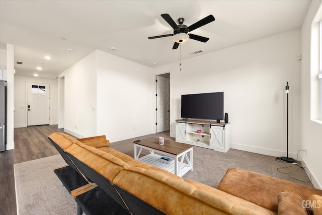 living area with visible vents, wood finished floors, recessed lighting, baseboards, and ceiling fan