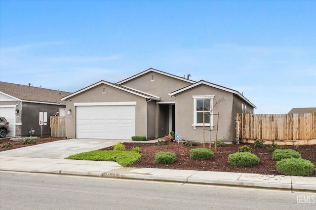 ranch-style home with stucco siding, concrete driveway, a garage, and fence