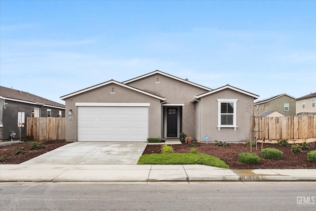 ranch-style home featuring stucco siding, an attached garage, concrete driveway, and fence