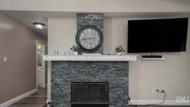 6003 Bluewater Bay Ct, Bakersfield, CA 93312 - detailed view of wood finished floors and a stone fireplace
