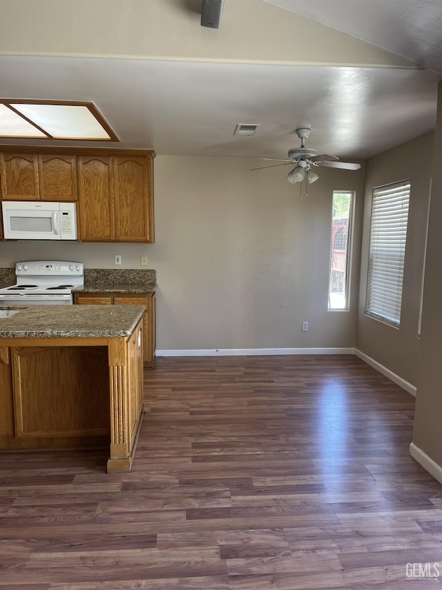5700 Via Marisol St, Bakersfield, CA 93308 - kitchen with white appliances, brown cabinets, a ceiling fan, and dark wood-type flooring