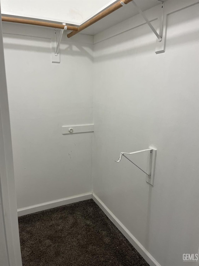 5700 Via Marisol St, Bakersfield, CA 93308 - walk in closet featuring dark carpet