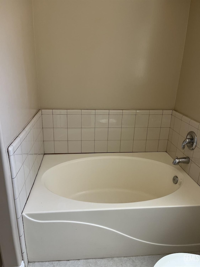 5700 Via Marisol St, Bakersfield, CA 93308 - bathroom featuring a garden tub and tile patterned floors
