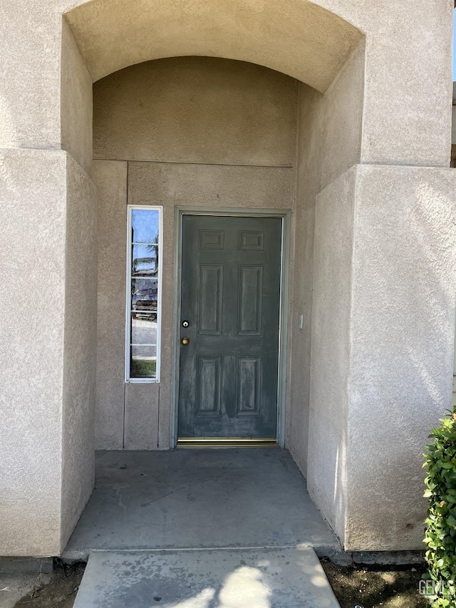 5700 Via Marisol St, Bakersfield, CA 93308 - doorway to property featuring stucco siding