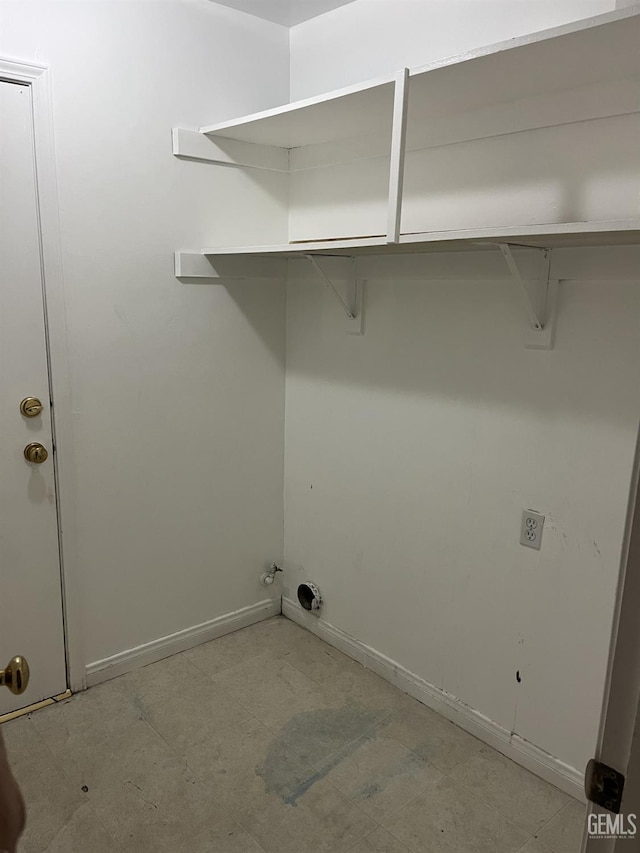 5700 Via Marisol St, Bakersfield, CA 93308 - laundry area featuring baseboards and hookup for a gas dryer
