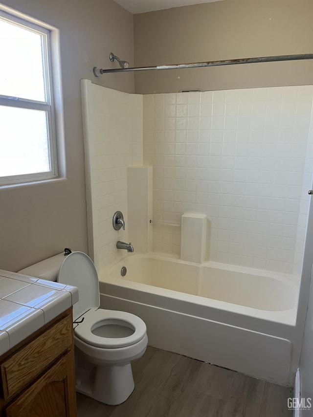 5700 Via Marisol St, Bakersfield, CA 93308 - bathroom featuring vanity, tub / shower combination, and wood finished floors