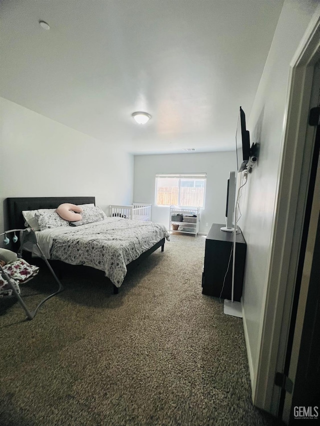 318 Smoke Tree Ct, Wasco, CA 93280 - bedroom with carpet flooring and baseboards