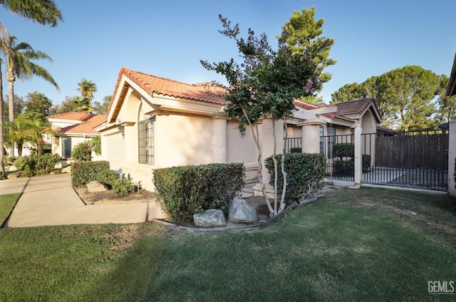 view of property exterior with a lawn