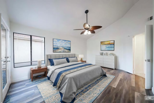 bedroom with ceiling fan, hardwood / wood-style flooring, and high vaulted ceiling