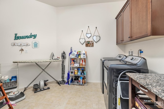 9803 Petersburg Pl, Bakersfield, CA 93306 - washroom with separate washer and dryer, cabinet space, and baseboards