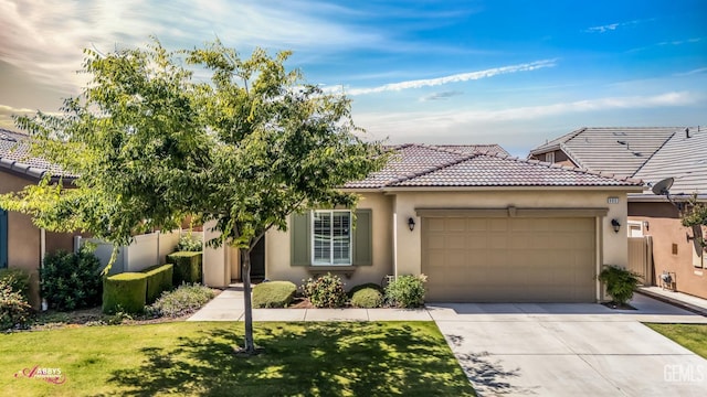 9803 Petersburg Pl, Bakersfield, CA 93306 - view of front of property with a garage, stucco siding, a tile roof, and concrete driveway