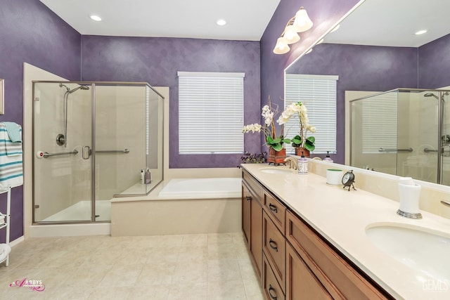 9803 Petersburg Pl, Bakersfield, CA 93306 - full bath featuring a shower stall, a garden tub, double vanity, and recessed lighting