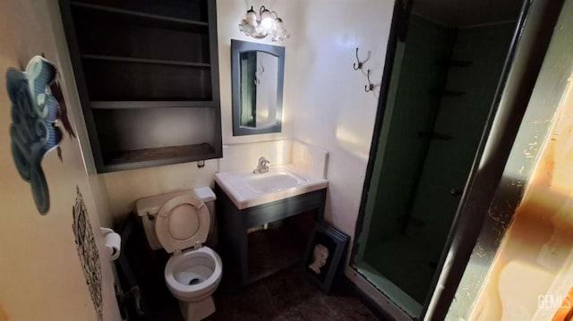 113 Easy St, Bakersfield, CA 93308 - bathroom featuring a stall shower, toilet, and a sink