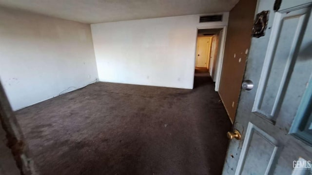 113 Easy St, Bakersfield, CA 93308 - empty room with dark colored carpet