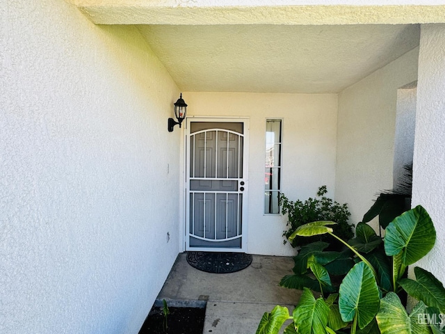 2120 Lamplight Ln, Delano, CA 93215 - view of exterior entry with stucco siding