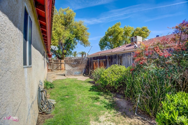 view of yard featuring a fenced backyard