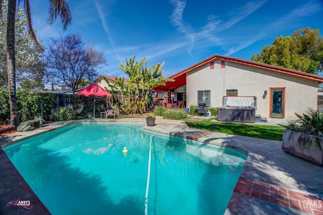 view of pool with a fenced in pool, a patio, and fence