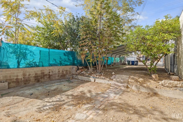 view of yard featuring a carport