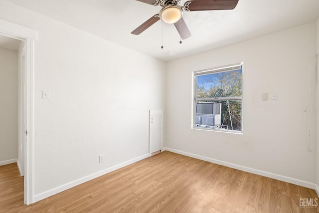 unfurnished room featuring light hardwood / wood-style flooring and ceiling fan