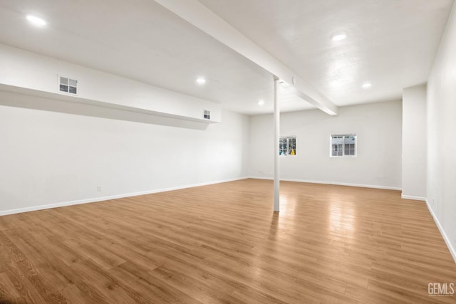 basement with light wood-type flooring