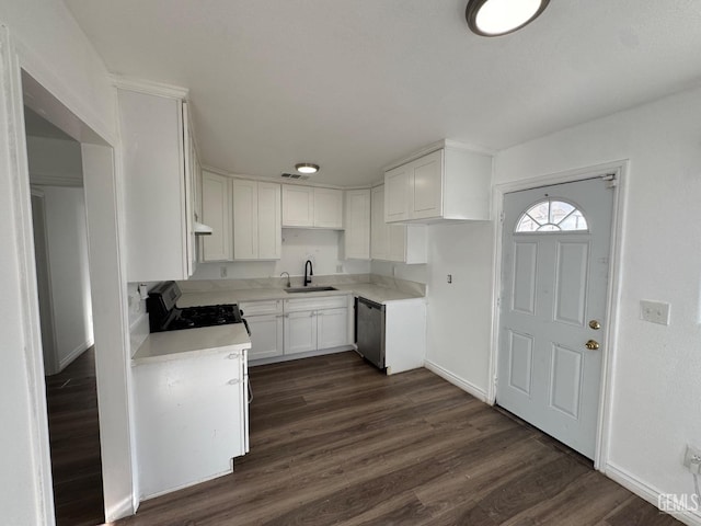 kitchen with stainless steel dishwasher, sink, electric range, white cabinets, and dark hardwood / wood-style floors