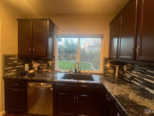 kitchen featuring dark brown cabinets, stainless steel dishwasher, a sink, and decorative backsplash