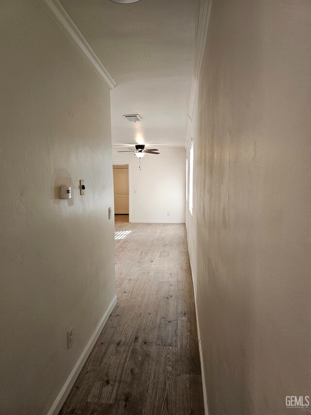 2131 Berger St, Bakersfield, CA 93305 - unfurnished room with baseboards, wood finished floors, and a ceiling fan