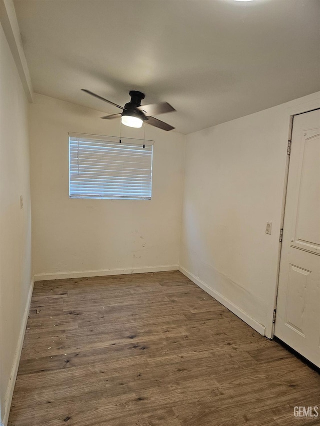 2131 Berger St, Bakersfield, CA 93305 - unfurnished living room with visible vents, ornamental molding, a ceiling fan, and wood finished floors