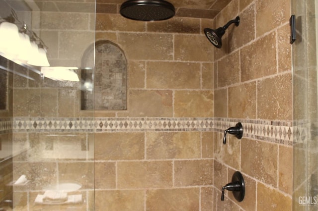 details featuring a tile shower