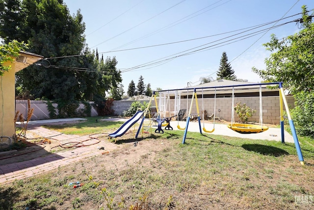 view of jungle gym featuring a yard