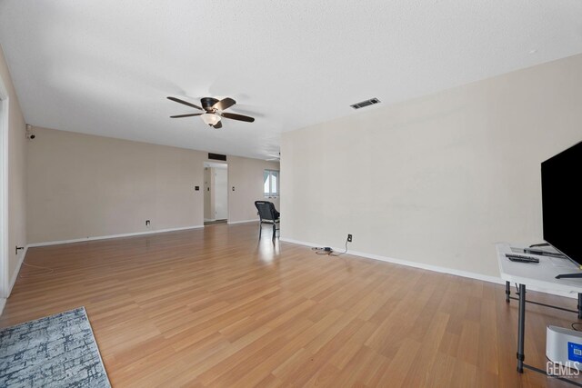 interior details featuring hardwood / wood-style flooring and a brick fireplace