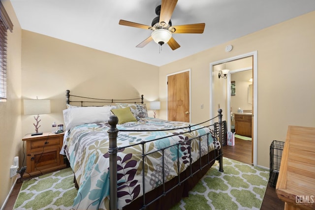 bedroom with baseboards, a ceiling fan, and wood finished floors